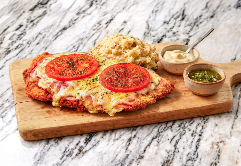 Premium Milanesa Napolitana with rustic mashed potatoes