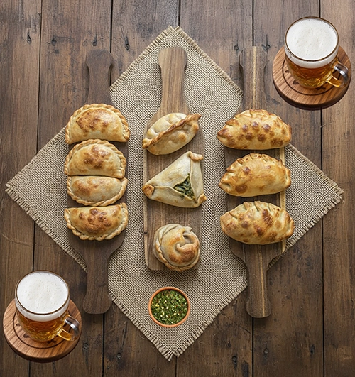 Different flavors of empanadas Beef, Chicken, Spinach, Five Cheese, Caprese, Corn, Ham and Cheese - Sabores del Abuelo, Argentinian food in Orlando